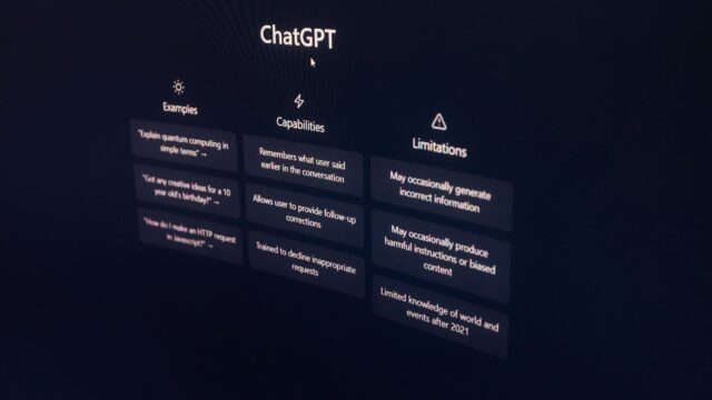 Minimalist close-up of ChatGPT interface displayed on a dark monitor screen, highlighting AI technology.